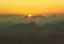CLICK FOR FULLSIZE IMAGE The new year sun coming up over clouds 