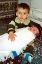 CLICK FOR FULLSIZE IMAGE Thea' holds his new baby brother, Kamal 