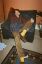 CLICK FOR FULLSIZE IMAGE Leggy Thomas reclines in his flat 