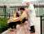 CLICK FOR FULLSIZE IMAGE A man has a haircut in Houhai Park 