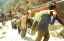 CLICK FOR FULLSIZE IMAGE Sixty men carrying electrical cable up Tai Shan 
