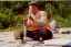 CLICK FOR FULLSIZE IMAGE A Tibetan park worker takes time off to spin 