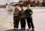 CLICK FOR FULLSIZE IMAGE The Uighur girl's brother, with his friends, kiting on the empty new road 