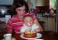 CLICK FOR FULLSIZE IMAGE Samuel with his first birthday cake 