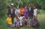 CLICK FOR FULLSIZE IMAGE Ibraev and Shapak cousins family portrait in the orchard, with me added 