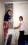 CLICK FOR FULLSIZE IMAGE Bobo (left) and Sisi repapering the main room 