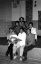 CLICK FOR FULLSIZE IMAGE Horolsuren and her family sit at the edge of their stage in the former social club 