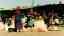 CLICK FOR FULLSIZE IMAGE Turkmen women selling foul-tasting crisps outside Mary railway station 